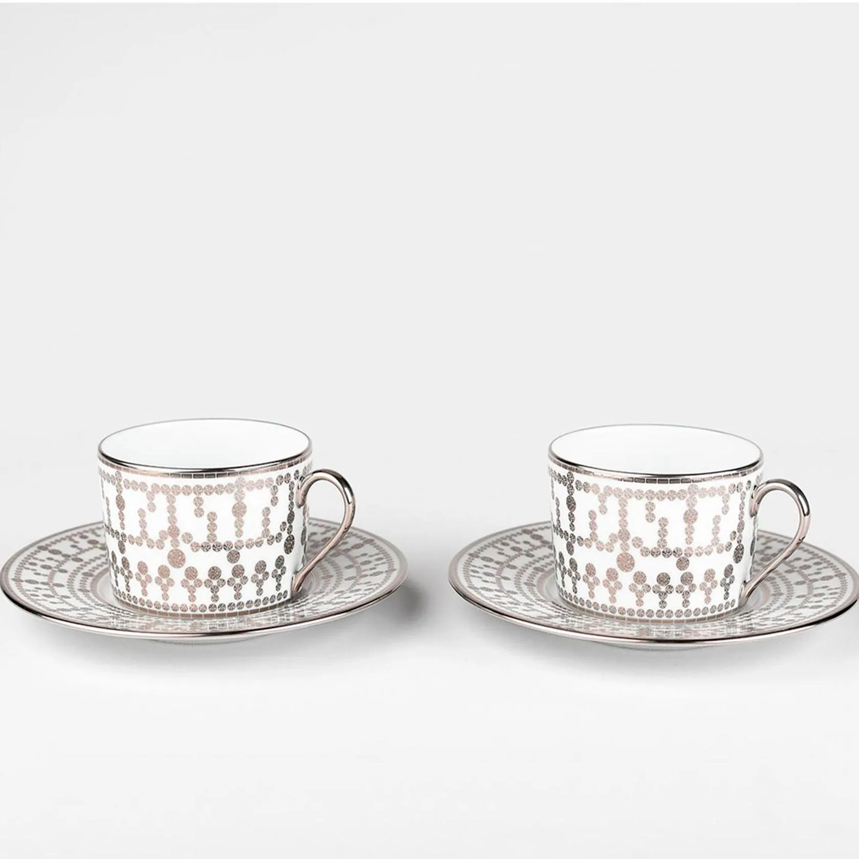 Set of 2 tea cups and saucers