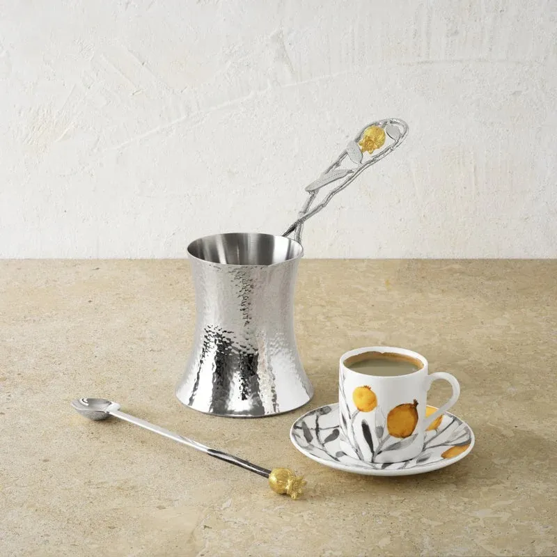 Coffee pot with spoon