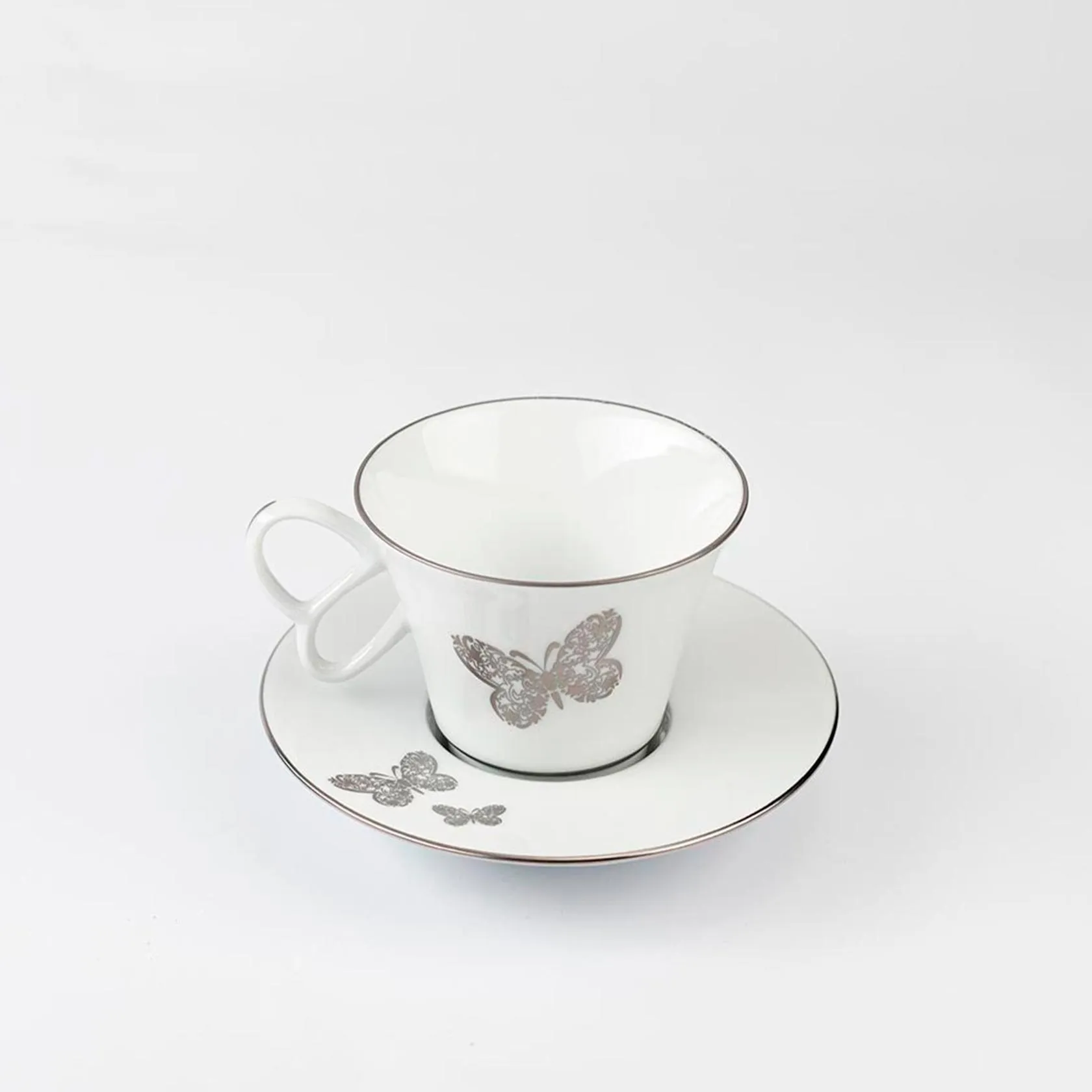 Set of 2 tea cups and saucers