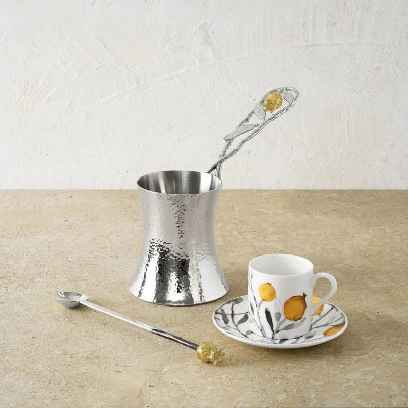 Coffee pot with spoon
